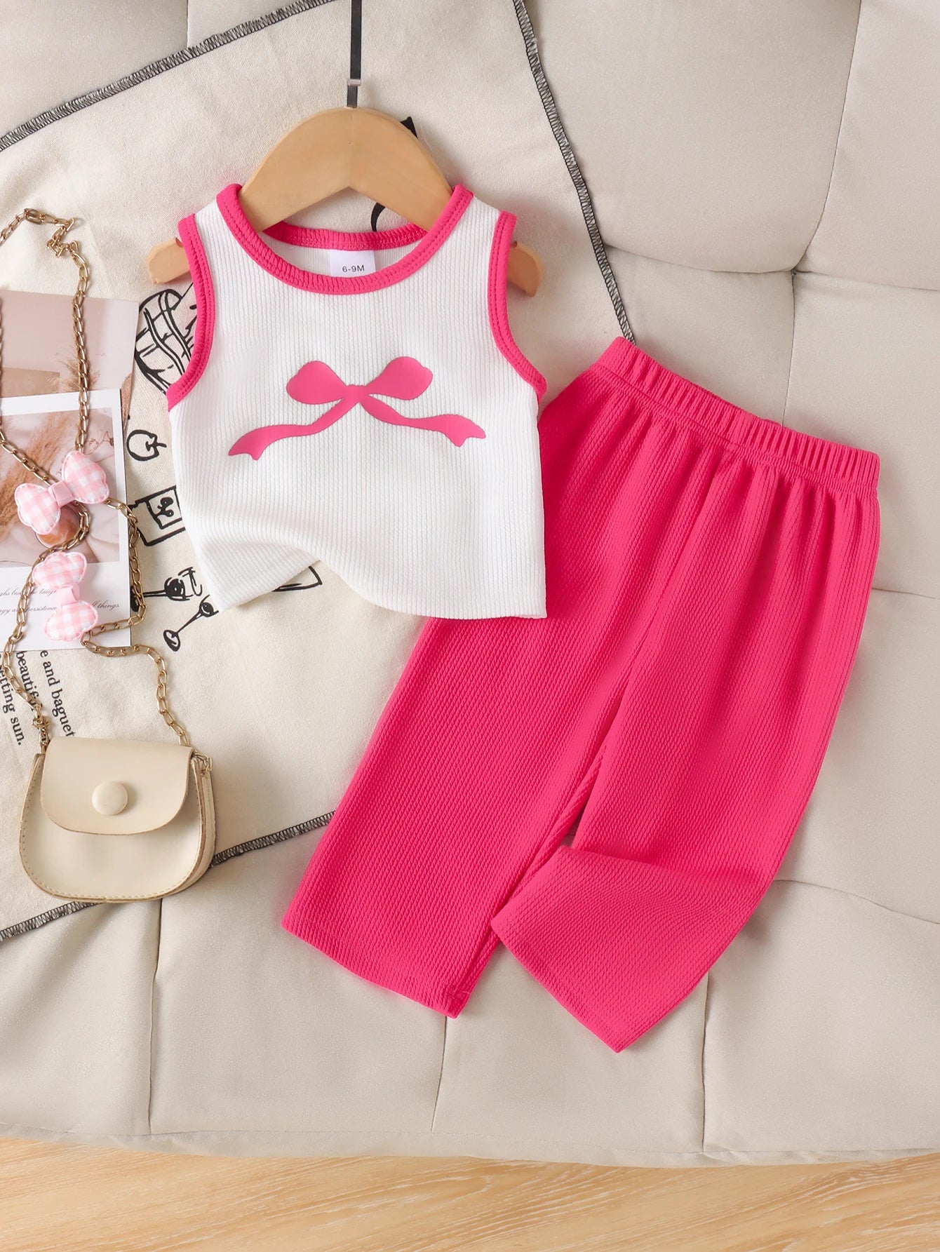 Cross-border summer new collection for girls, comfortable and stylish, suitable for ages 1-3. Bow tie white vest + long pants.